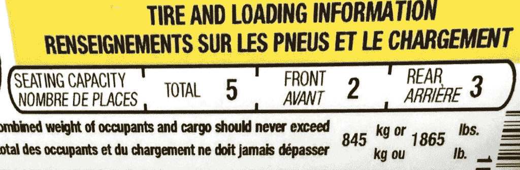 Ford F-150 tire and loading sticker showing 1,865 lb payload
